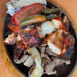 The platter. Feeds 3-4 people. Didn't get the ribs so we got extra chicken.