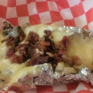 Super papa. Supposed to have Carne asada on it but only had cheese and bacon. Double check your orders