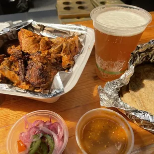 Whole chicken carry out for lunch. Chicken, salsa, pickled onion and tortillas.