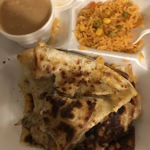 #1 combo plate. Never saw frozen veggies in "Spanish" rice before - all in all has no flavor. The beans look and taste nasty.