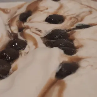 Milk Tea with Boba, a delicious blend of tea in a creamy frozen version. Available at Polly Ann Ice Cream.