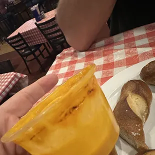 Melted cup of "beer cheese"