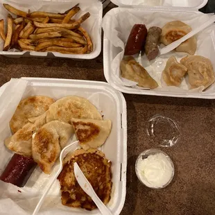 Pierogi Plate with French fries for one and potato pancakes for the other