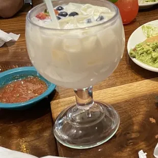 The piña colada I ordered  so sweet and the glass was the size of BOTH my hands, it was like a bowl!