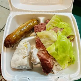 Sausage and corned beef cabbage with coconut cream taro