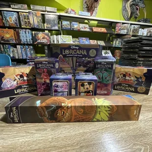 Those are the products from Disney Lorcana I got at Polyhedron Gamestore. This is the back room when I started opening my cards.