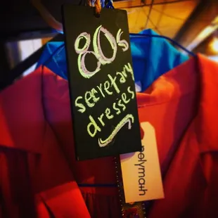 VINTAGE CLASSIC. A large assortment of vintage 1980s secretary dresses.