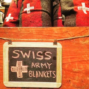 GIFTS. Like these imported vintage-inspired Swiss Army wool blankets.