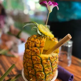 Amazing pina colada drink with souvenir straws