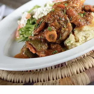 Baked lamb skank
Pomandolive