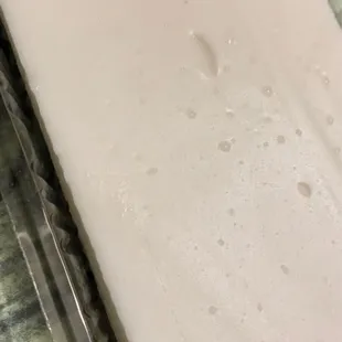 a close up of a piece of cheese