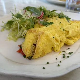 l&apos;Omelette Spinach, Chèvre, Tomato, Chive, Petite Salade. It may look like not much but very filling!