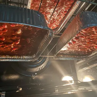 Homemade lasagna family meal deal served with green salad and garlic bread for four