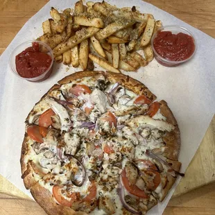 Creamy garlic, chicken, pizza along side with oven baked garlic fries