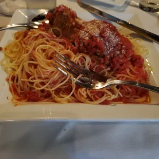 Angel hair pasta with really good meatballs.  You me and meatballs.