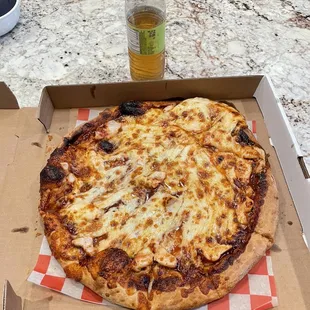 Cheese slid off my Large BBQ Chicken pizza on the way home. About to try it. Bottle in the picture for size reference.