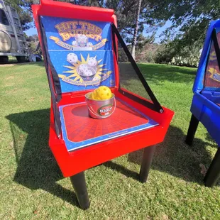 Carnival game hit the bucket