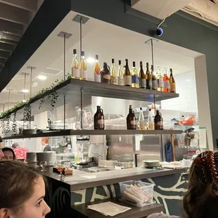 people sitting at a bar