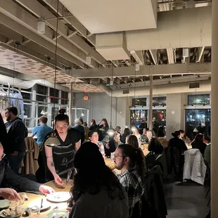 a group of people sitting at a table
