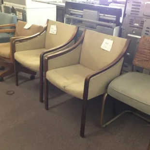 DIYers: $10 for the pair. Love the lines of these chair. Some TLC and reupholstery would do the trick.