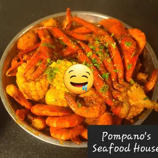 a bowl of shrimp and carrots