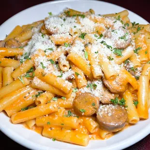 Ziti with Sugarosa Sauce with added Sliced Italian Sausage.