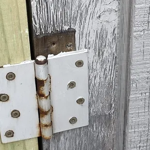 a close up of a door hinge