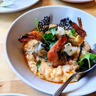 Grilled Texas Shrimp - risotto, pine nuts, pepitas, squid ink chip, chili oil, cilantro