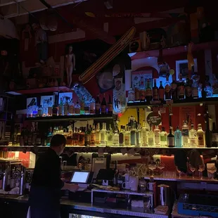 a man standing at the bar
