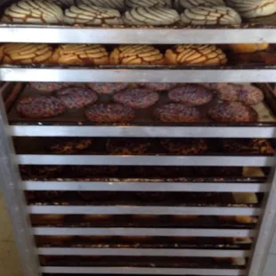 a rack of doughnuts in a bakery