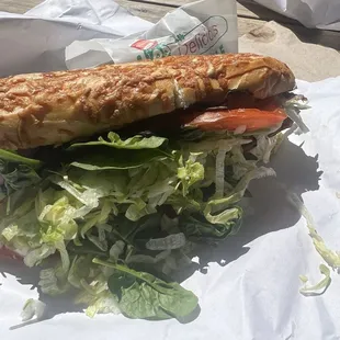 The Rancher on Parmesan brea with extra meat and bacon