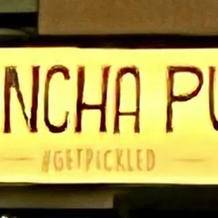 a neon sign for a restaurant