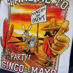 a man holding a t - shirt