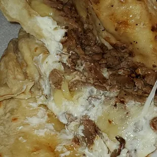 a close up of a pita sandwich