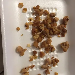 This is all the &quot;chicken&quot; that just rolled out of my burrito. Burnt, hard, greasy, leftovers.