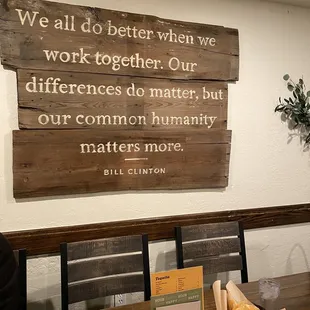 a sign with a quote