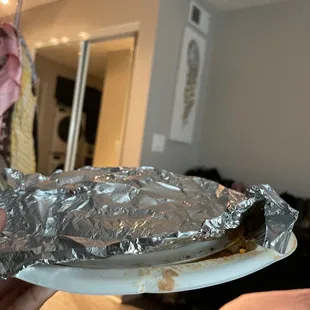 Rice &amp; beans on a flimsy plate.