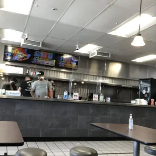 a view of a restaurant counter