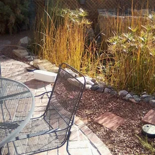This is one of the backyards we have put in for our customers.  Please note the brick work &amp; the decorative grasses