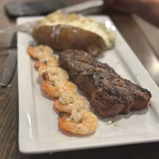 Filet with shrimp and baked potato