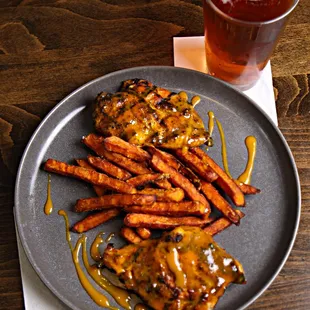 Boneless, all-natural chicken breasts blackened with Cajun spices, then brushed with our honey mustard BBQ sauce