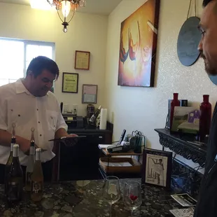 David, the owner of Pondl, pouring samples of their white wines.