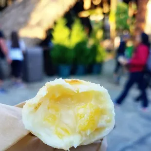 Pongu Lumpia - surprisingly scrumptious - it's a lightly pineapple-flavored pastry filled with cream cheese. Try it!