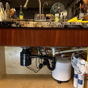 Under counter system with dual-head faucet