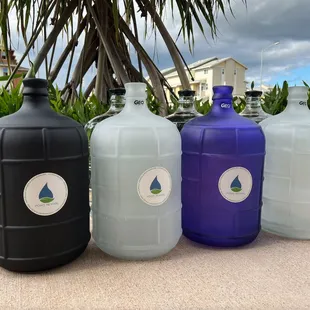three large jugs of water