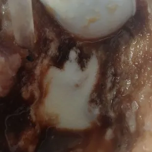 Inside chocolate snoball with the vanilla soft serve