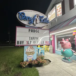 the outside of a store at night