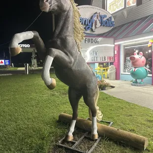a statue of a horse standing on its hind legs