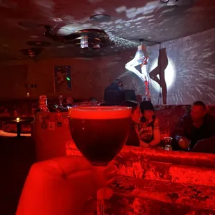 a glass of wine in a bar