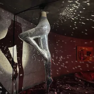 a woman standing on a bed